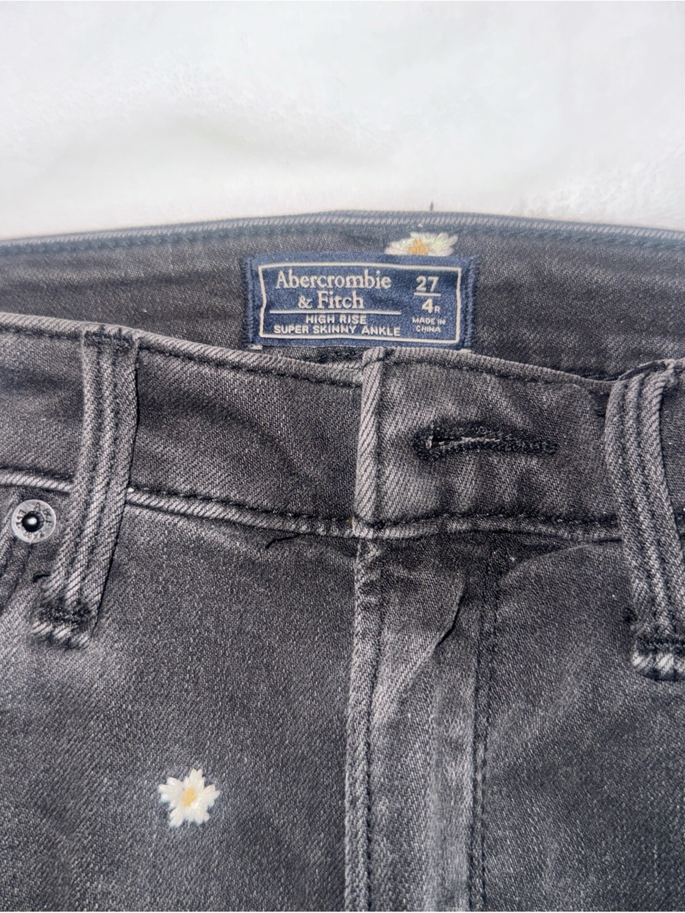 Abercrombie & Fitch Black High-Rise Super Skinny Jeans with Daisy Embroidery